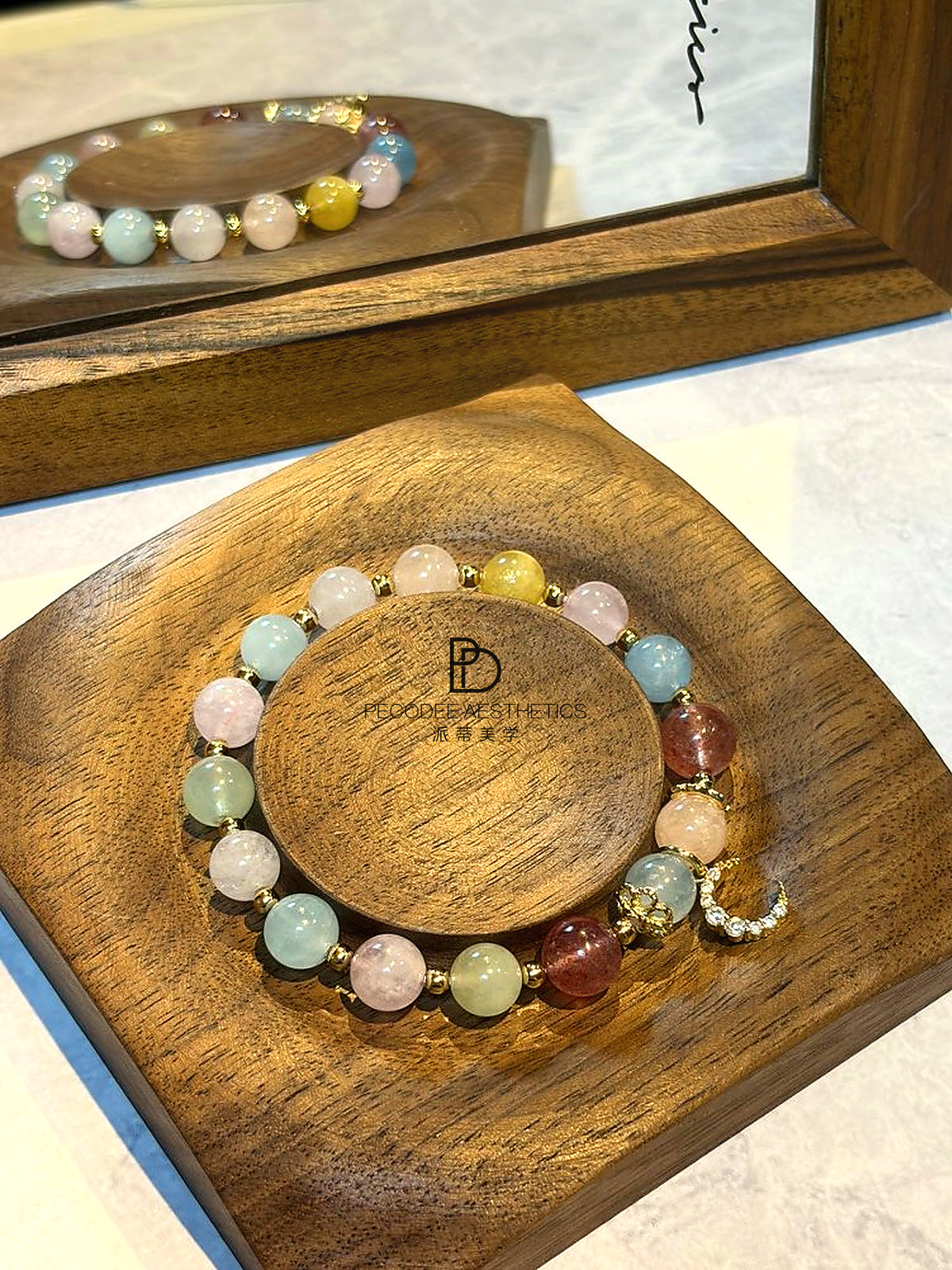 Multicolor pastel bead bracelet with gold chain and rhinestone letter C charm