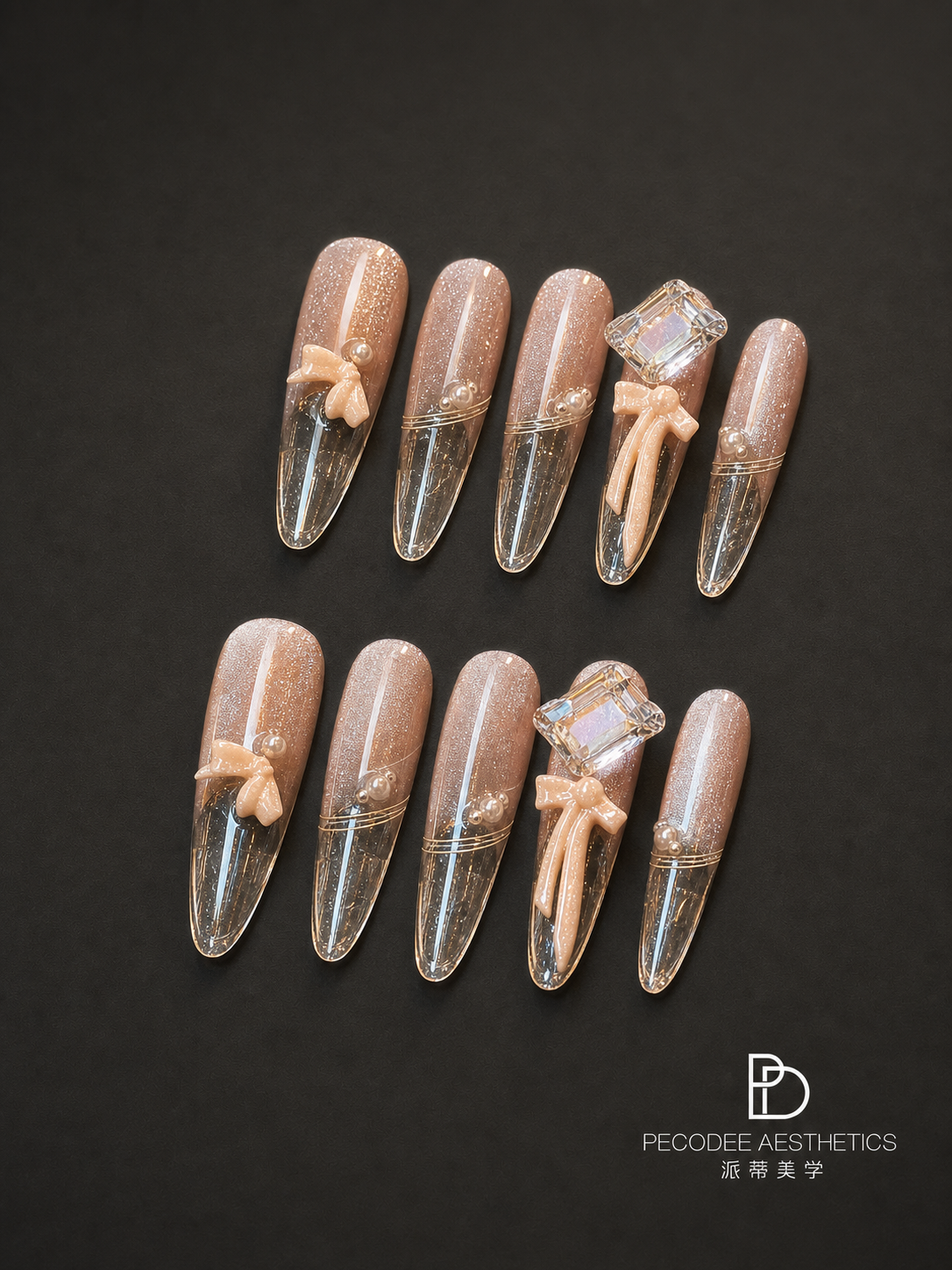 Champagne crystal acrylic nail set, clear tips with champagne glitter and rhinestone detail