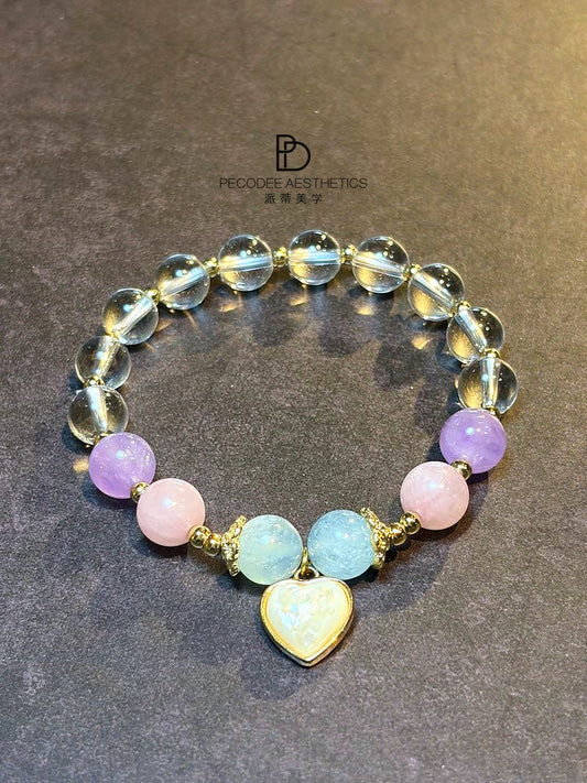 Heart charm beaded bracelet with opalescent blue, pink & purple beads, gold-tone links